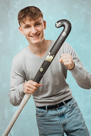Man holding a hockey stick
