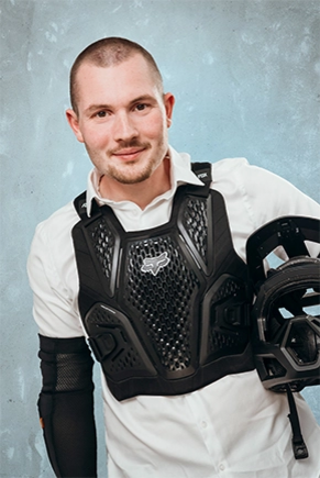 Man wearing protective clothing for mountain biking